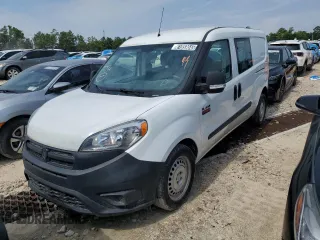 2018 Ram ProMaster City Cargo Tradesman with VIN ZFBERFAB1J6J59416, listed as a Copart auction lot 61859045 with 122,537 mi miles and Clean title. Bid and sale history available at DreamBid. Image 1.