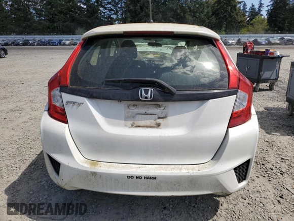 2016 Honda Fit LX z VIN JHMGK5H5XGX027499, wystawiony jako Copart lot #55629475 z przebiegiem Nie podano mil oraz Szkody całkowita. Historia ofert i sprzedaży dostępna na DreamBid. Obrazek 6.