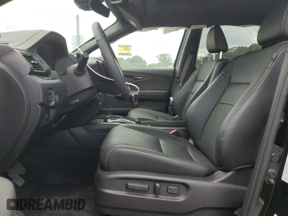 2023 Honda Passport Elite with VIN 5FNYF8H01PB030270, listed as a Copart auction lot 61402965 with 7,931 mi miles and Salvage title. Bid and sale history available at DreamBid. Image 7.