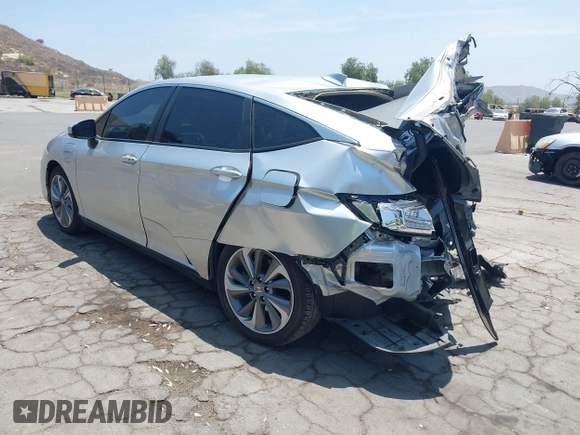 2018 Honda Clarity Touring z VIN JHMZC5F31JC021516, wystawiony jako IAAI lot #42478787 z przebiegiem 87 519 mil mil oraz . Historia ofert i sprzedaży dostępna na DreamBid. Obrazek 3.