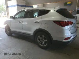 2017 Hyundai Santa Fe 2.4L z VIN 5XYZTDLB4HG440683, wystawiony jako Copart lot #55408975 z przebiegiem 105 014 mil mil oraz Szkoda całkowita • Salvage title. Historia ofert i sprzedaży dostępna na DreamBid. Obrazek 2.