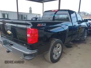 2014 Chevrolet Silverado 1500 LT with VIN 1GCVKREC5EZ325771, listed as a IAAI auction lot 41691858 with 123,475 mi miles and . Bid and sale history available at DreamBid. Image 4.