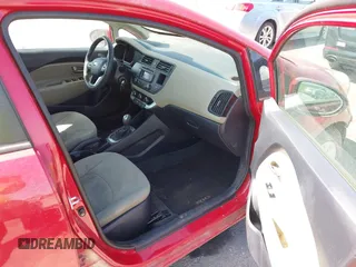 2014 Kia Rio LX with VIN KNADM4A32E6334330, listed as a IAAI auction lot 42239542 with 134,314 mi miles and . Bid and sale history available at DreamBid. Image 5.