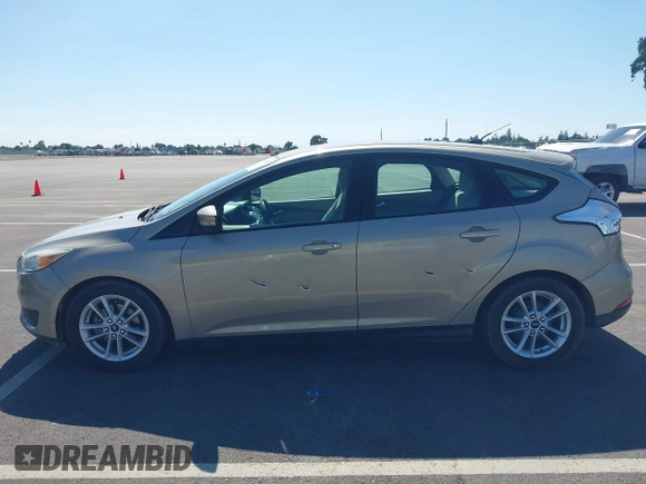 2015 Ford Focus SE with VIN 1FADP3K21FL222119, listed as a IAAI auction lot 42146787 with 148,091 mi miles and . Bid and sale history available at DreamBid. Image 14.