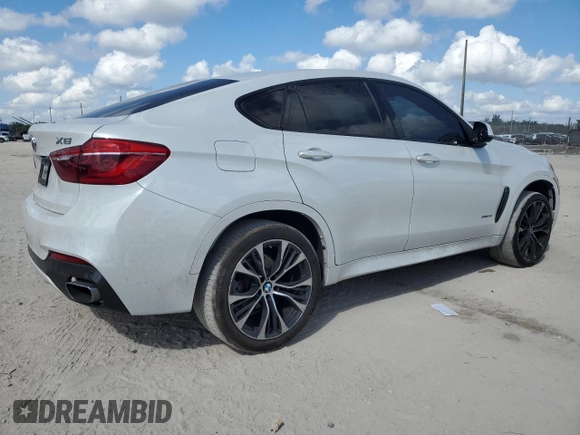 2019 BMW X6 xDrive35i with VIN 5UXKU2C5XK0Z63599, listed as a Copart auction lot 44612065 with 105,898 mi miles and Non Repairable. Bid and sale history available at carsss.com. Image 3.