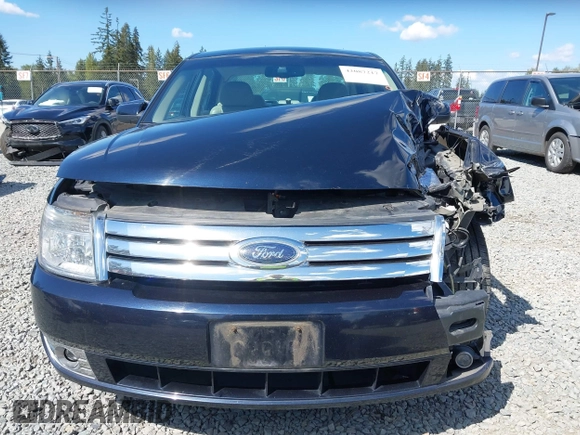 2008 Ford Taurus SEL with VIN 1FAHP24W98G140677, listed as a IAAI auction lot 42087217 with 151,693 mi miles. Bid and sale history available at carsss.com. Image 12.