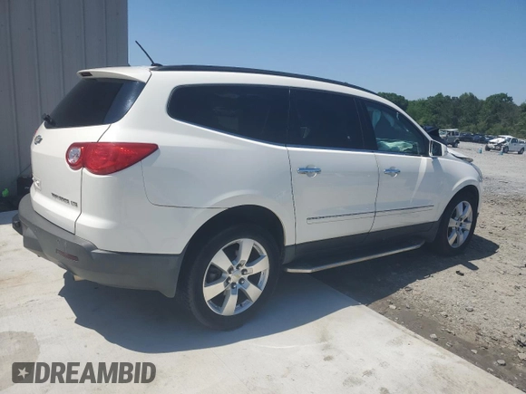 2012 Chevrolet Traverse LTZ z VIN 1GNKRLED5CJ233616, wystawiony jako Copart lot #52309145 z przebiegiem Nie podano mil oraz Szkoda całkowita • Salvage title. Historia ofert i sprzedaży dostępna na DreamBid. Obrazek 3.