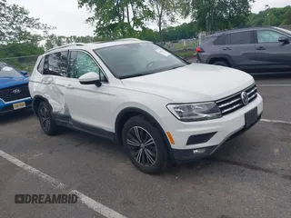 2018 Volkswagen Tiguan SEL with VIN 3VV2B7AX4JM012840, listed as a IAAI auction lot 42263511 with 105,510 mi miles and . Bid and sale history available at DreamBid. Image 1.