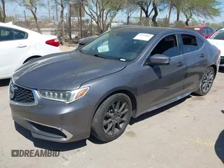 2018 Acura TLX Technology z VIN 19UUB2F50JA006646, wystawiony jako IAAI lot #42323007 z przebiegiem 80 884 mil mil oraz . Historia ofert i sprzedaży dostępna na DreamBid. Obrazek 2.