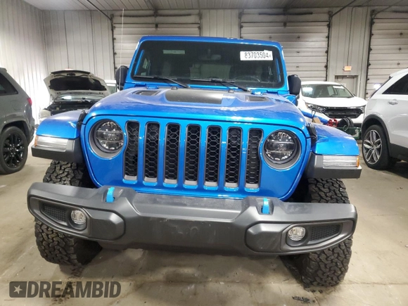 2022 Jeep Wrangler Unlimited Rubicon with VIN 1C4JJXR69NW190564, listed as a Copart auction lot 83703504 with 16,803 mi miles and Salvage title. Bid and sale history available at DreamBid. Image 5.