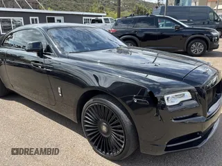 2019 Rolls-Royce Wraith z VIN SCA665C54KUX87311, wystawiony jako Copart lot #52000635 z przebiegiem 14 875 mil mil oraz Tytuł czysty. Historia ofert i sprzedaży dostępna na DreamBid. Obrazek 1.