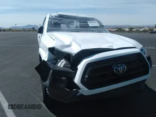 2020 Toyota Tacoma SR with VIN 5TFRX5GN1LX180442, listed as a IAAI auction lot 42090748 with 70,449 mi miles and . Bid and sale history available at DreamBid. Image 6.