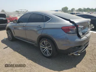 2015 BMW X6 xDrive35i with VIN 5UXKU2C58F0F95304, listed as a Copart auction lot 64668453 with 141,413 mi miles. Bid and sale history available at carsss.com. Image 2.