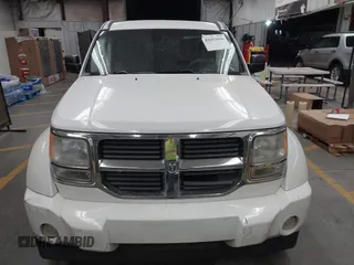 2007 Dodge Nitro SLT with VIN 1D8GU58K97W583408, listed as a IAAI auction lot 41653696 with 124,449 mi miles. Bid and sale history available at carsss.com. Image 12.