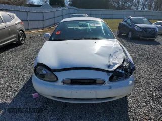 1999 Mercury Sable LS z VIN 1MEFM53S2XA624653, wystawiony jako Copart lot #45967215 z przebiegiem 264 081 mil mil oraz Szkoda całkowita • Salvage title. Historia ofert i sprzedaży dostępna na DreamBid. Obrazek 5.