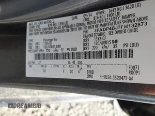 2015 Ford Fiesta SE with VIN 3FADP4BJ7FM132873, listed as a IAAI auction lot 41812405 with 180,522 mi miles. Bid and sale history available at carsss.com. Image 9.