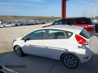 2019 Ford Fiesta SE with VIN 3FADP4EJ4KM136871, listed as a IAAI auction lot 42075343 with 89,185 mi miles and . Bid and sale history available at DreamBid. Image 15.