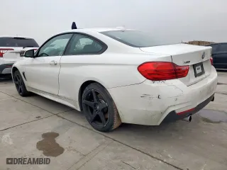 2015 BMW 4 Series 435i xDrive with VIN WBA3R5C56FK371424, listed as a Copart auction lot 45650215 with 67,928 mi miles and Salvage Title. Bid and sale history available at carsss.com. Image 2.