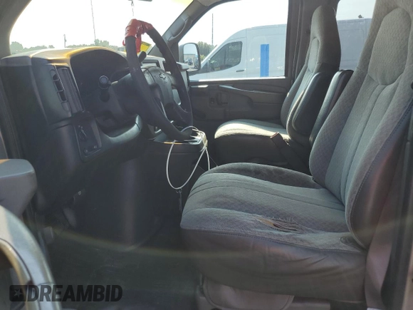 2004 Chevrolet Express Passenger with VIN 1GAHG39U741128458, listed as a Copart auction lot 64436215 with 118,387 mi miles and Salvage title. Bid and sale history available at DreamBid. Image 7.