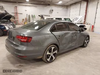 2017 Volkswagen Jetta 1.4T S with VIN 3VW2B7AJ2HM370097, listed as a IAAI auction lot 41822751 with 103,059 mi miles. Bid and sale history available at carsss.com. Image 4.