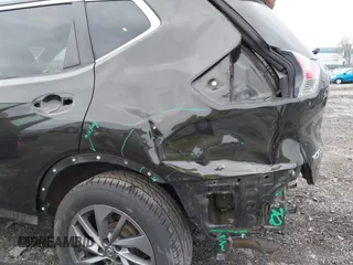 2016 Nissan Rogue SV with VIN 5N1AT2MV0GC856643, listed as a IAAI auction lot 41887299 with 174,382 mi miles and . Bid and sale history available at DreamBid. Image 6.