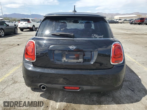 2019 MINI Hardtop Cooper with VIN WMWXP5C5XK2H29936, listed as a Copart auction lot 56713285 with 80,303 mi miles and Salvage title. Bid and sale history available at DreamBid. Image 6.