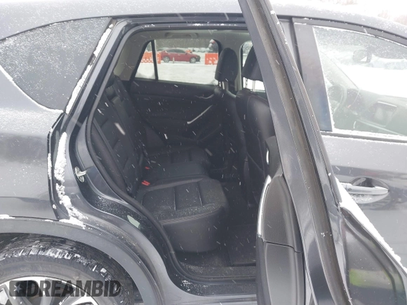 2016 Mazda CX-5 Grand Touring with VIN JM3KE4DY2G0913412, listed as a IAAI auction lot 41616132 with 85,166 mi miles. Bid and sale history available at carsss.com. Image 8.