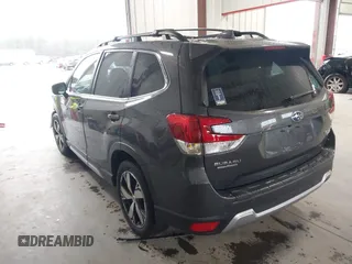 2021 Subaru Forester Touring with VIN JF2SKAXC8MH500831, listed as a IAAI auction lot 41564481 with 56,403 mi miles and . Bid and sale history available at DreamBid. Image 3.