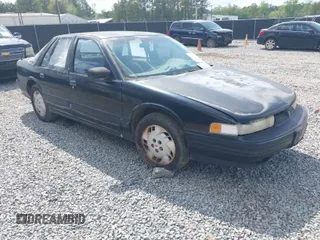 1996 Oldsmobile Cutlass Supreme S z VIN 1G3WH52M2TF363353, wystawiony jako IAAI lot #41955292 z przebiegiem 143 347 mil mil oraz . Historia ofert i sprzedaży dostępna na DreamBid. Obrazek 1.