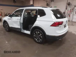 2022 Volkswagen Tiguan S with VIN 3VV0B7AX1NM066089, listed as a IAAI auction lot 41686335 with 64,115 mi miles. Bid and sale history available at carsss.com. Image 3.