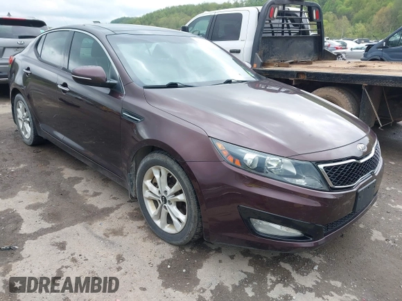 2011 Kia Optima EX with VIN KNAGN4A69B5148919, listed as a IAAI auction lot 42133805 with 112,114 mi miles and . Bid and sale history available at carsss.com. Image 1.