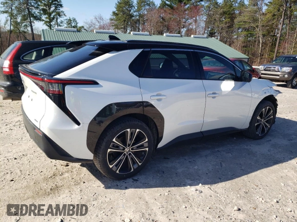 2023 Toyota bZ4X XLE with VIN JTMABACA9PA041997, listed as a Copart auction lot 52922215 with 6,490 mi miles and Salvage Title. Bid and sale history available at DreamBid. Image 3.