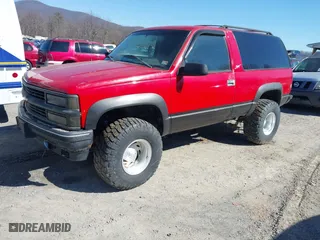 1999 Chevrolet Tahoe with VIN 3GNEK18R7XG189820, listed as a IAAI auction lot 41631906 with 212,720 mi miles. Bid and sale history available at carsss.com. Image 18.