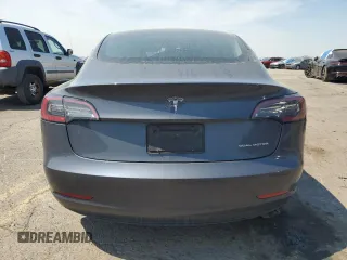 2023 Tesla Model 3 Long Range with VIN 5YJ3E1EB2PF389041, listed as a Copart auction lot 53450725 with 27,060 mi miles and Salvage Title. Bid and sale history available at DreamBid. Image 6.