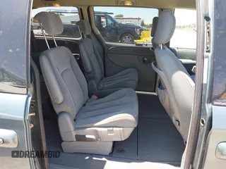 2005 Dodge Caravan SXT with VIN 2D4GP44L95R565529, listed as a IAAI auction lot 42460426 with 97,882 mi miles and . Bid and sale history available at DreamBid. Image 8.