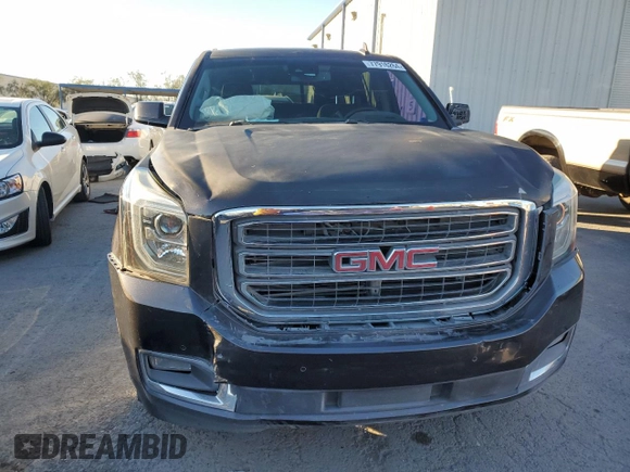 2017 GMC Yukon SLE with VIN 1GKS1AKC0HR240552, listed as a Copart auction lot 77916264 with 72,275 mi miles and Salvage Title. Bid and sale history available at carsss.com. Image 5.
