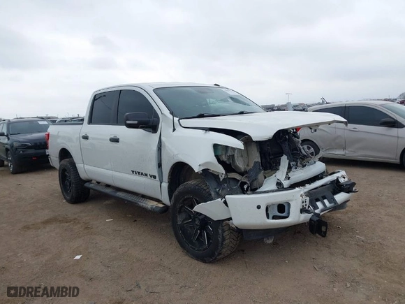 2019 Nissan Titan SV with VIN 1N6AA1E59KN530160, listed as a IAAI auction lot 41557126 with 128,594 mi miles. Bid and sale history available at carsss.com. Image 1.