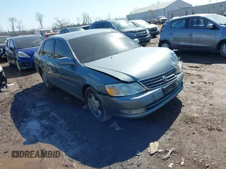 2003 Toyota Avalon XL z VIN 4T1BF28B33U293202, wystawiony jako IAAI lot #41768148 z przebiegiem 157 992 mil mil oraz . Historia ofert i sprzedaży dostępna na DreamBid. Obrazek 1.