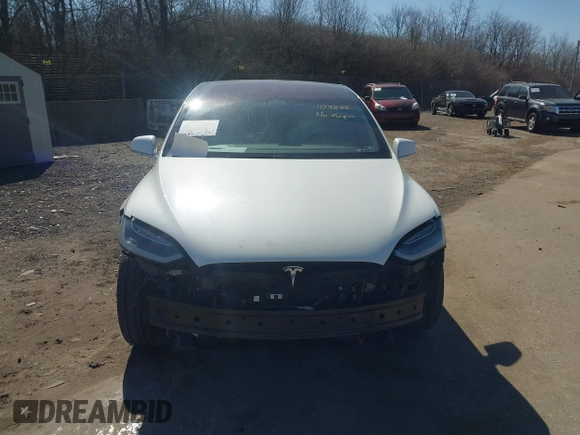 2018 Tesla Model X 75D with VIN 5YJXCAE45JF103828, listed as a IAAI auction lot 41698708 with 118,699 mi miles and . Bid and sale history available at carsss.com. Image 11.