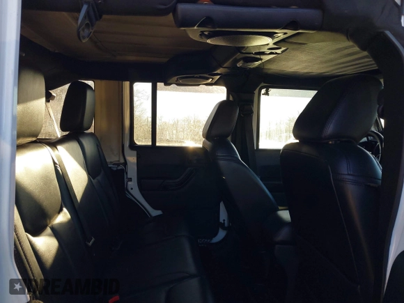 2014 Jeep Wrangler Unlimited Sahara with VIN 1C4HJWEG2EL273813, listed as a IAAI auction lot 41311011 with 96,104 mi miles. Bid and sale history available at carsss.com. Image 8.