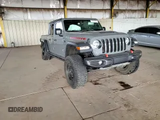 2020 Jeep Gladiator Mojave with VIN 1C6JJTEG1LL202459, listed as a Copart auction lot 79334434 with 49,515 mi miles and Salvage title. Bid and sale history available at DreamBid. Image 11.