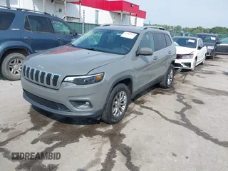 2020 Jeep Cherokee Latitude Plus with VIN 1C4PJMLB0LD651125, listed as a IAAI auction lot 42480253 with 105,649 mi miles and . Bid and sale history available at DreamBid. Image 2.