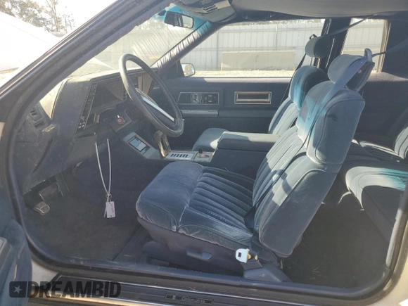 1987 Oldsmobile Toronado with VIN 1G3EZ1130HU307201, listed as a Copart auction lot 78028584 with 104,837 mi miles and Salvage Title. Bid and sale history available at DreamBid. Image 7.