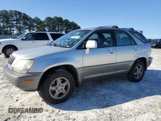 2002 Lexus RX 300 with VIN JTJHF10UX20270492, listed as a Copart auction lot 57504795 with 205,076 mi miles and Salvage title. Bid and sale history available at DreamBid. Image 1.