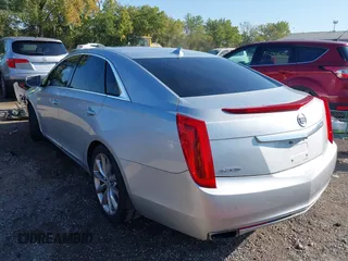 2013 Cadillac XTS Premium z VIN 2G61S5S30D9184910, wystawiony jako IAAI lot #40220419 z przebiegiem 111 330 mil mil oraz . Historia ofert i sprzedaży dostępna na DreamBid. Obrazek 3.