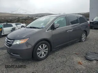 2014 Honda Odyssey EX-L with VIN 5FNRL5H61EB041024, listed as a Copart auction lot 50662215 with 190,896 mi miles and Salvage Title. Bid and sale history available at DreamBid. Image 1.