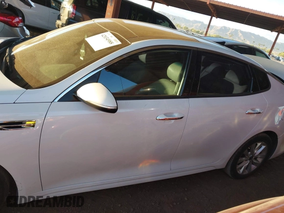 2016 Kia Optima EX with VIN 5XXGU4L30GG117411, listed as a IAAI auction lot 42034988 with 123,387 mi miles. Bid and sale history available at carsss.com. Image 14.