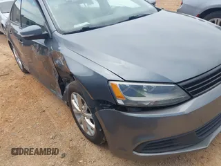 2011 Volkswagen Jetta SE with VIN 3VWDX7AJ4BM330203, listed as a IAAI auction lot 42256889 with 209,557 mi miles and . Bid and sale history available at DreamBid. Image 12.