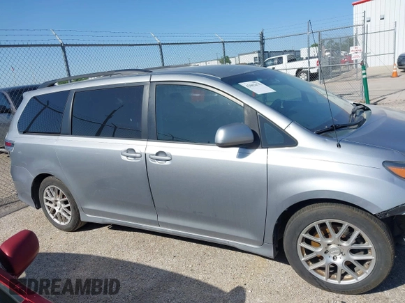 2011 Toyota Sienna SE with VIN 5TDXK3DC8BS131434, listed as a IAAI auction lot 42002675 with 209,396 mi miles. Bid and sale history available at carsss.com. Image 14.