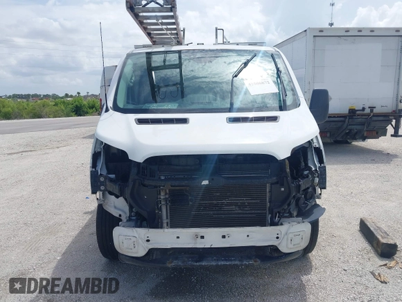 2015 Ford Transit Cargo with VIN 1FTNR1ZM9FKA50724, listed as a IAAI auction lot 42506872 with 155,117 mi miles and . Bid and sale history available at DreamBid. Image 6.